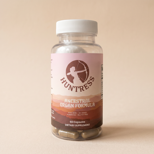 Huntress Ancestral Organ Formula bottle on a sandstone surface